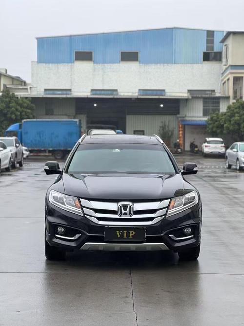 本田歌诗图2014款(本田歌诗图2014款的轮毂毫华和尊贵导的轮毂一样大吗)